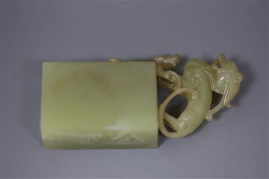 A Chinese greenish-yellow jade seal, 19th/20th century, H. 7.5cm